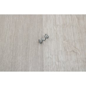 Fjeder For Tomgangs Skrue FK
